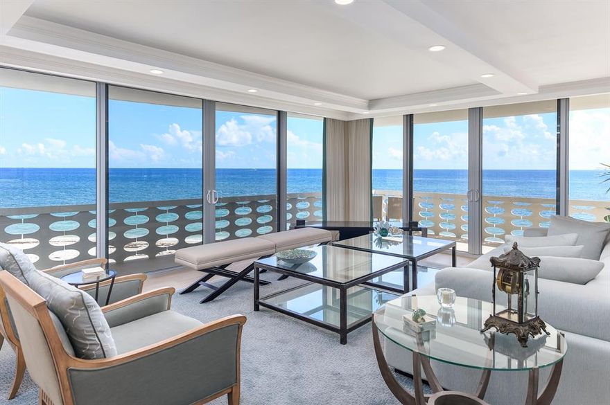 The Most Extraordinary Direct Ocean Views - In Town..this exceptionally designed open floor plan showcases breathtaking 180 degree unobstructed ocean views. Richly appointed two bedroom, two bath with exquisite custom details and finishes throughout. All features are of the highest caliber..including white washed solid oak floors, many unique upgrades, and an expansive beachfront terrace. Premier in town building offering unparalleled services..24/7 security, concierge, valets, and 2 car garage parking. Newly completed lobby, fitness center, and common areas. Steps to great dining, shopping, and The Breakers Resort.