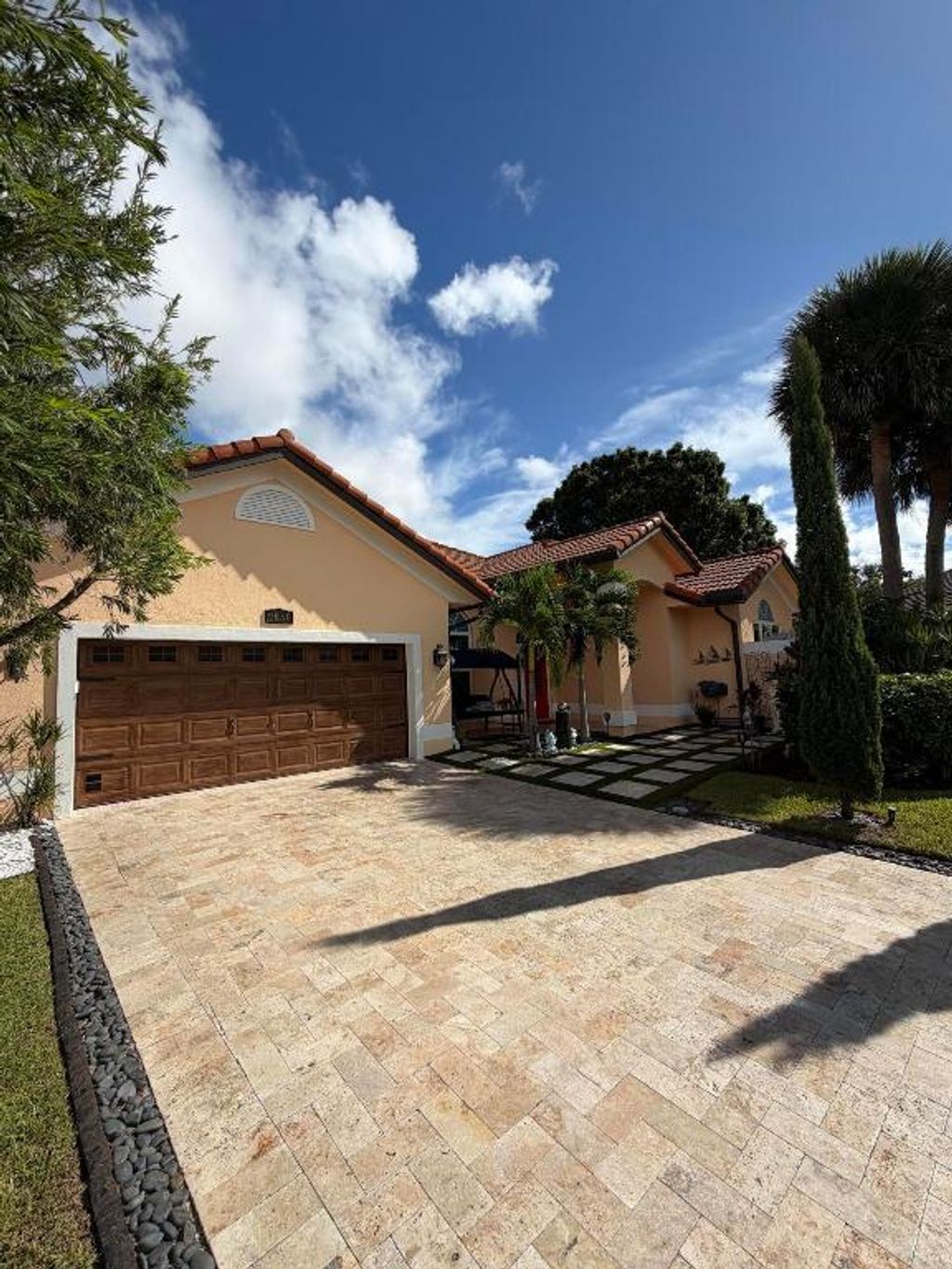 Photo of 9050 Cypress Hollow Drive, Palm Beach Gardens, FL 33418 (MLS # R11153810)