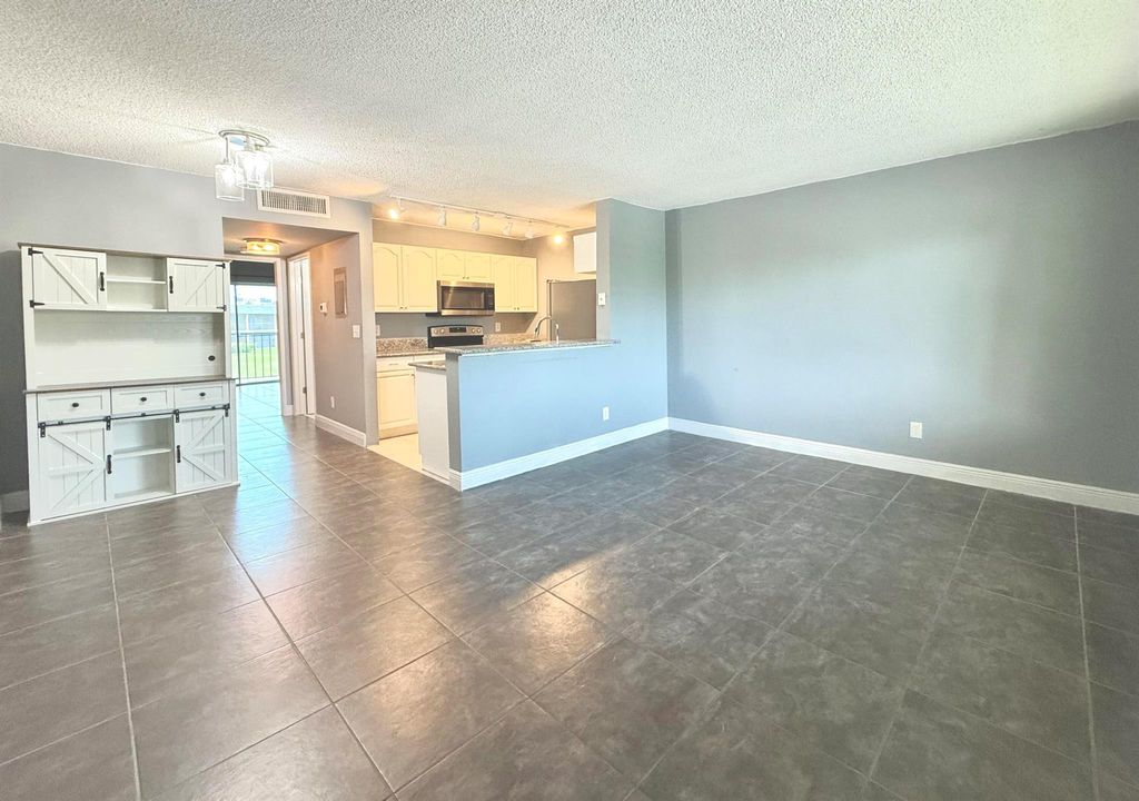 Photo of 1625 Meadows Circle W, Boynton Beach, FL 33436 (MLS # R11104150)