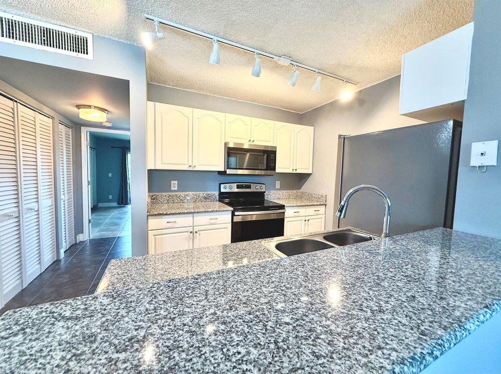 Photo of 1625 Meadows Circle W, Boynton Beach, FL 33436 (MLS # R11104150)