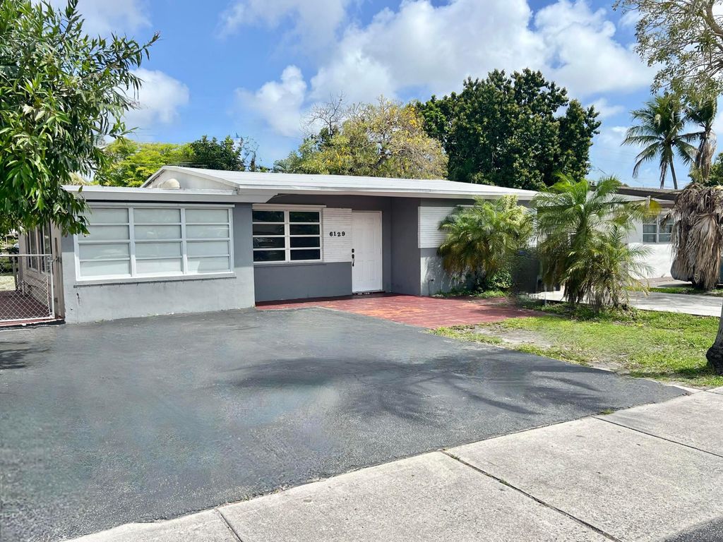 Photo of 6129 Funston Street, Hollywood, FL 33023 (MLS # B26023230)