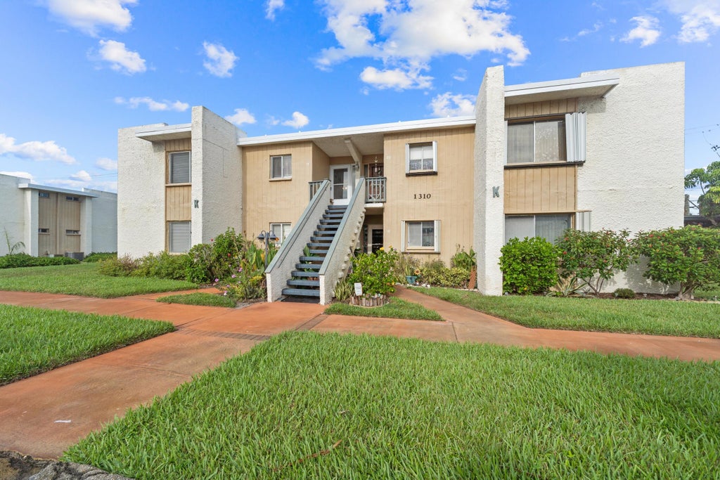 Photo of 1310 NE 14th Court #K 19, Jensen Beach, FL 34957 (MLS # B26070062)