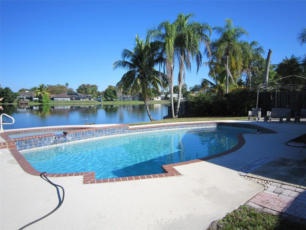 Photo of 8009 NW 51st Ct, Lauderhill, FL 33351 (MLS # F10538406)