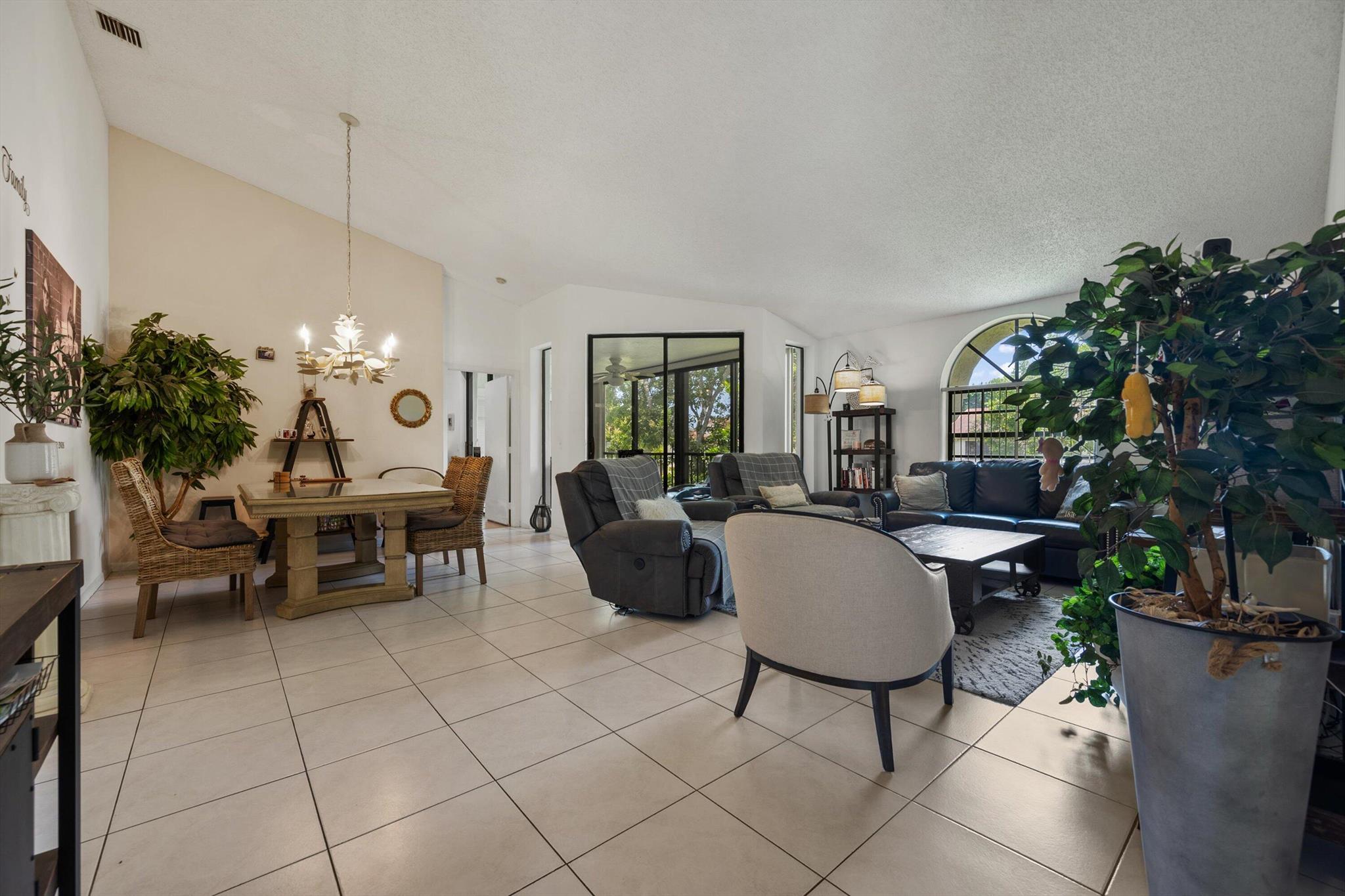 LAKEVIEW Grandi Model 3 bedroom 2 Bathroom Condo With Its Own Elevator In PLATINA's Beautiful Blue & White Illustre Village. When Entering This Unit, You Can Decide Whether To Use The Private Staircase Or Your Private Elevator. Once Upstairs, You Will Be Greeted By A Very Spacious Living Place That Is Bright And Airy With Vaulted Ceilings. Ceramic Tile Spans The Living Areas, Kitchen And Third Bedroom While The Master And Second Bedroom Have Laminate Flooring. Open Up The Glass Sliding Doors Of The Screened Lanai To Bring The Outside In Or Keep It Closed And Air-Conditioned And Enjoy The View To One Of The 10 Lakes In The Community. Updated Eat-In Kitchen With Stainless Steel Appliances, Large Pantry And Lots Of Storage. The SPLIT FLOOR PLAN Provides Privacy For You And Your Guests.