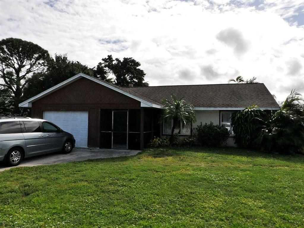 Photo of 1526 SE Port St Lucie Boulevard, Port Saint Lucie, FL 34953 (MLS # R10712773)