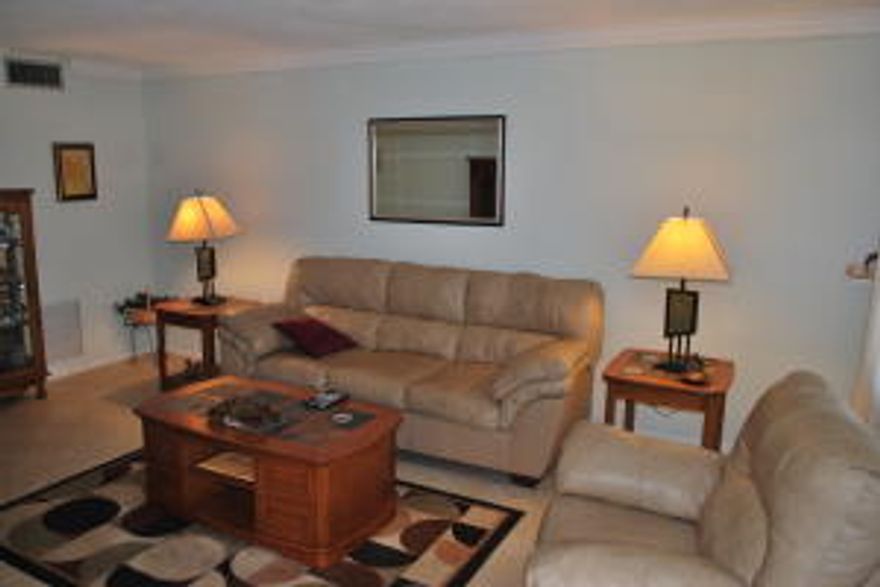 Bright Clean and updated corner unit. This building has just installed a new lift so you can enjoy the breeze on the second floor without using the stairs. Living room features a large screen TV and modern comfortable furniture. The secondary bedroom has a Murphy bed for guests. Century Village has fantastic amenities including a very well equipped fitness center and a large clubhouse with a 1200+  seat theater with regular live shows and movies.