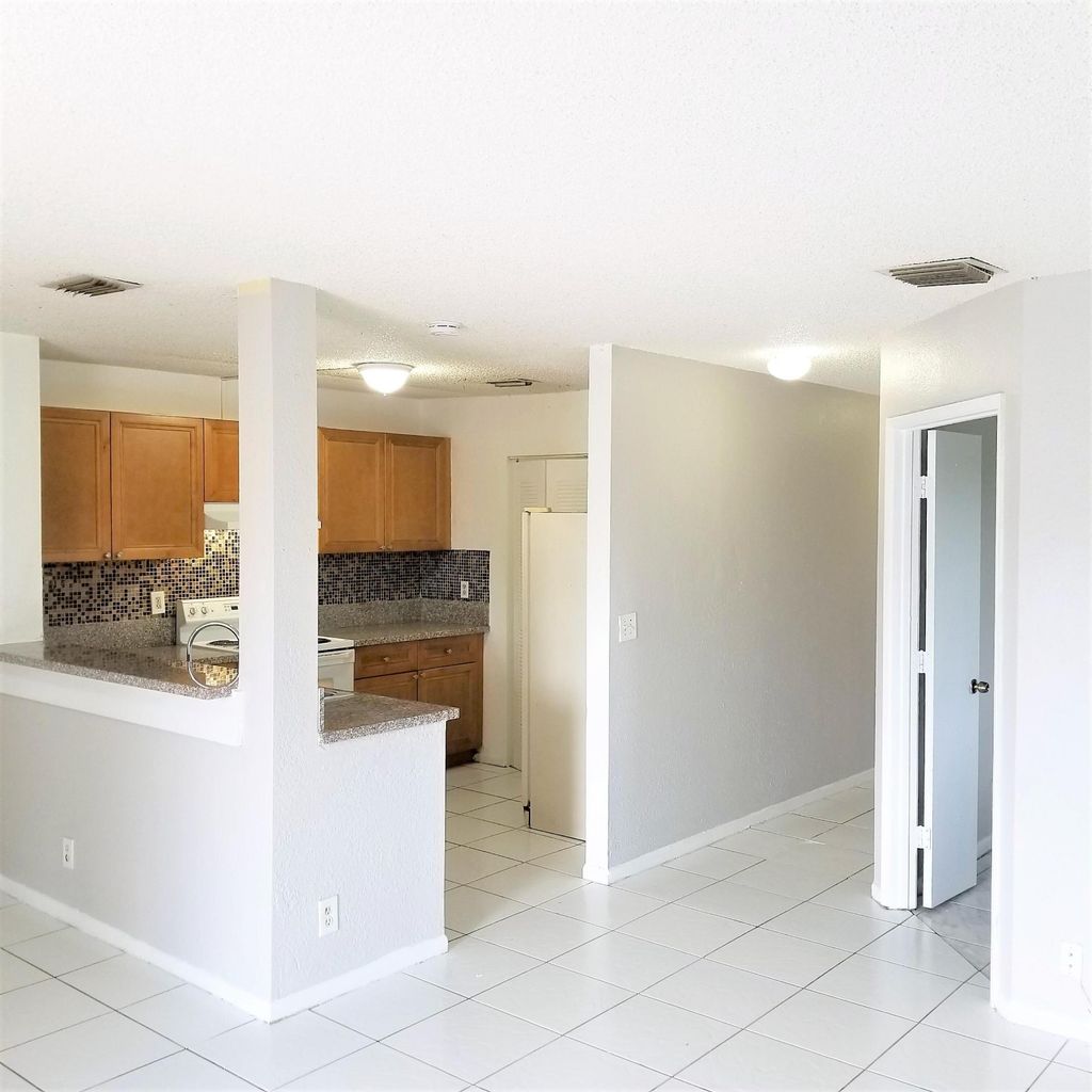Photo of 11403 NW 35th Street, Coral Springs, FL 33065 (MLS # B26029900)