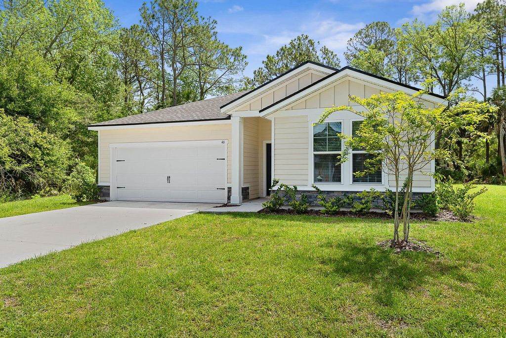 Photo of 46 Poplar Drive, Palm Coast, FL 32164 (MLS # B26012202)