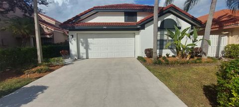 Photo of 9401 NW 18th Drive, Plantation, FL 33322 (MLS # F10534991)
