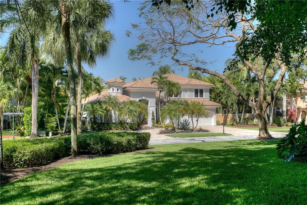 Photo of 10301 Blue Palm St, Plantation, FL 33324 (MLS # F10378503)