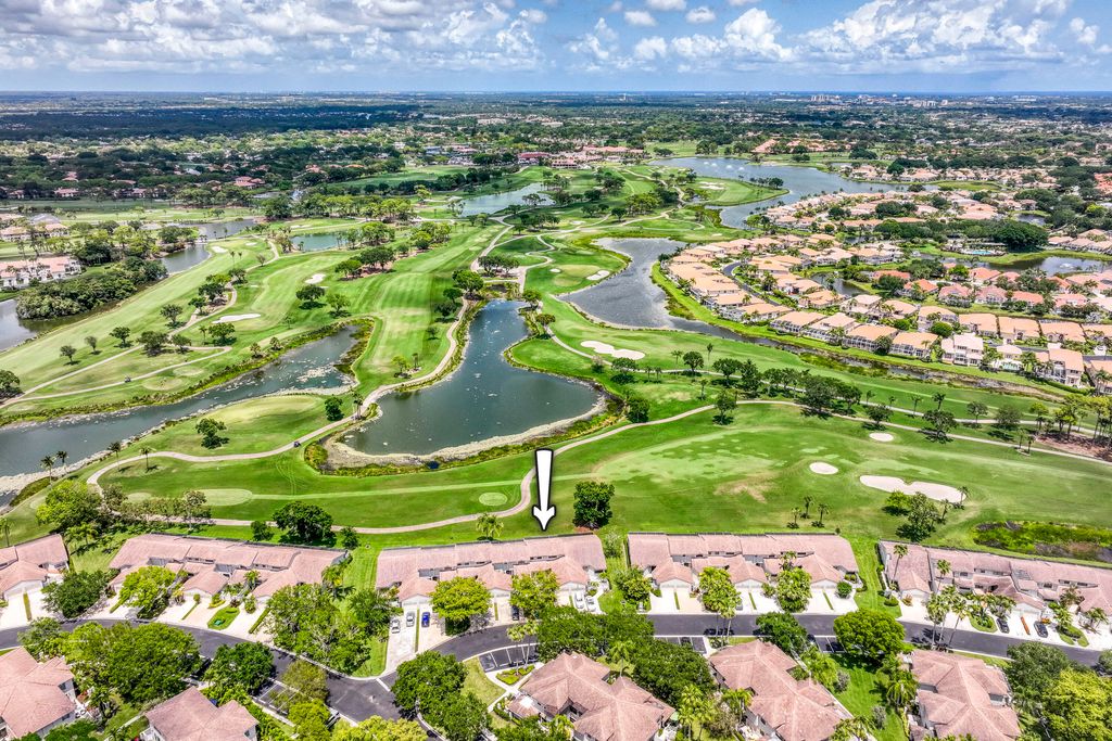 Photo of 495 Prestwick Circle, Palm Beach Gardens, FL 33418 (MLS # B26024417)