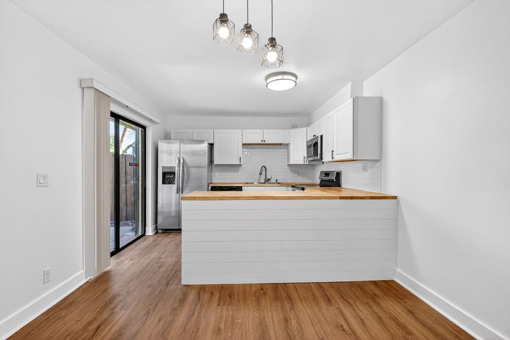 Photo of 198 Lake Arbor Drive, Lake Worth Beach, FL 33461 (MLS # R11165826)