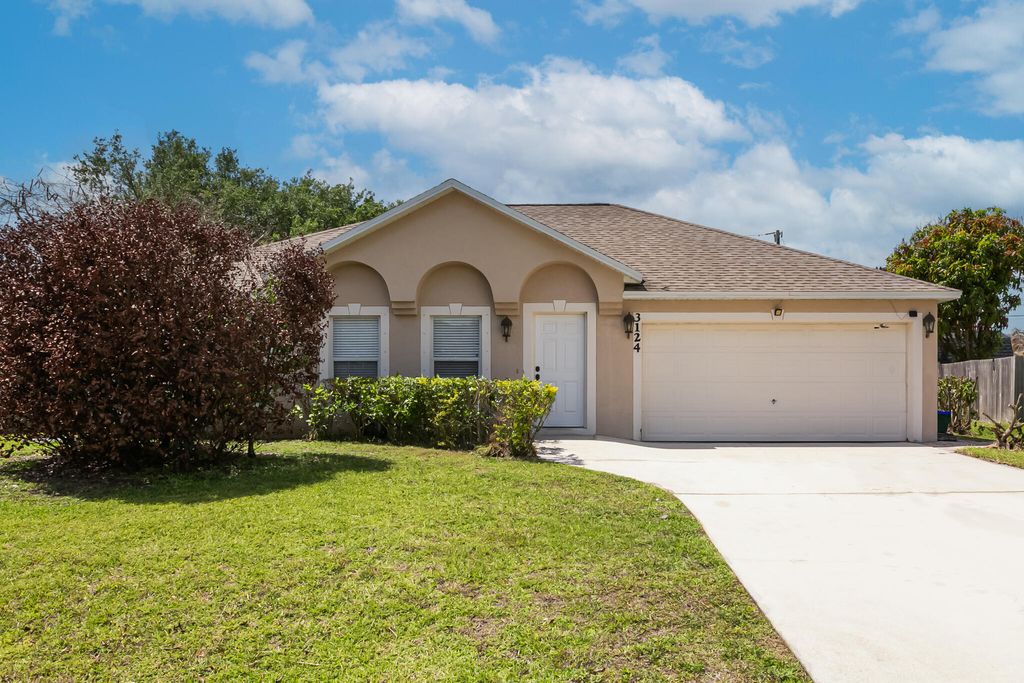 Photo of 3124 SW Armucher Street, Port Saint Lucie, FL 34953 (MLS # B26013738)