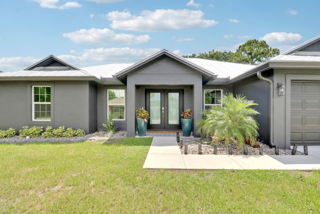 Photo of 5708 Tangelo Drive, Fort Pierce, FL 34982 (MLS # R11099694)