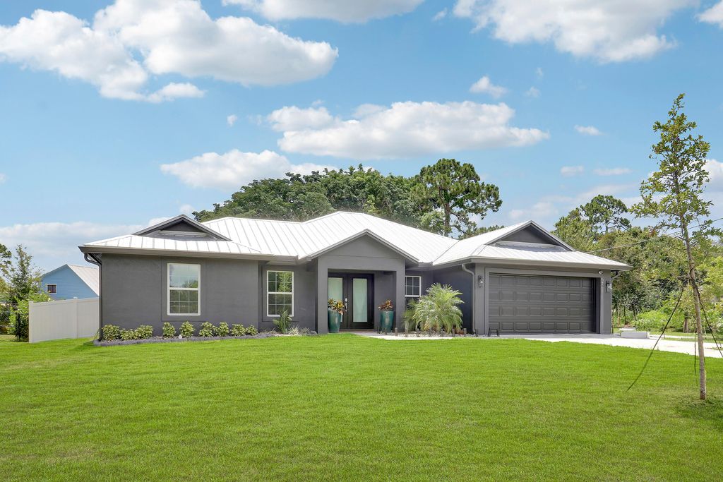Photo of 5708 Tangelo Drive, Fort Pierce, FL 34982 (MLS # R11099694)