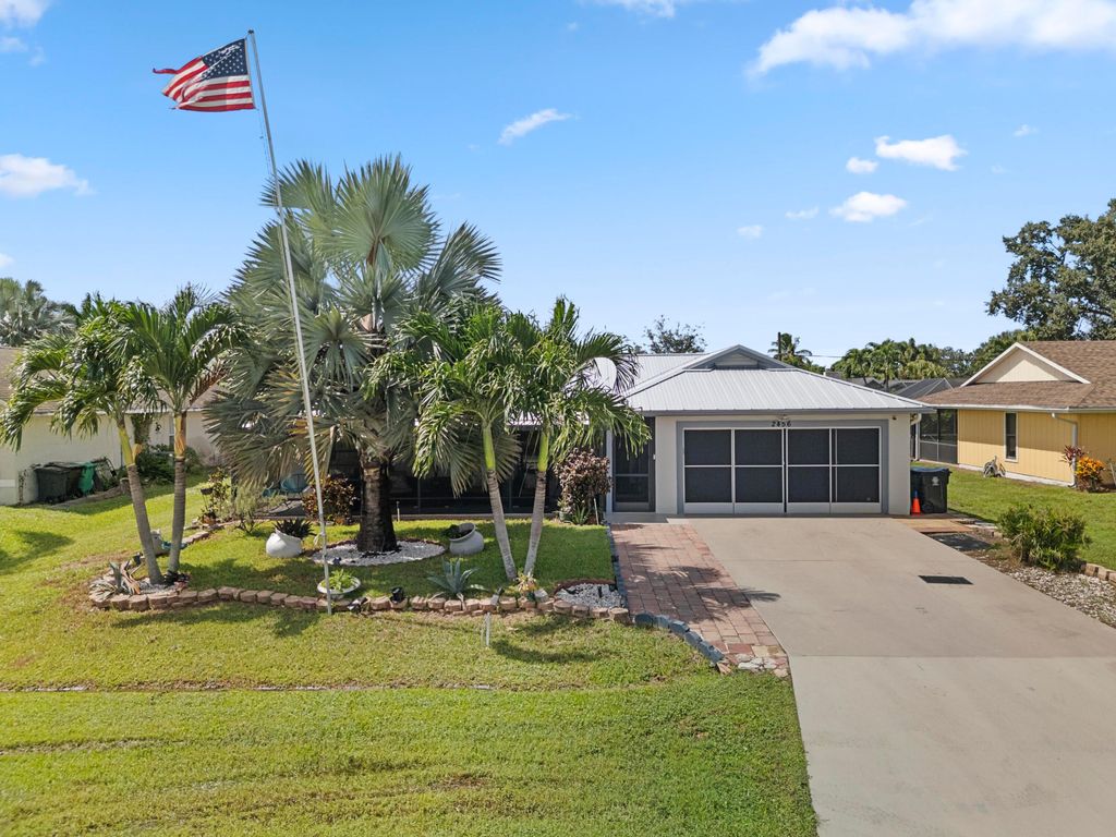 Photo of 2456 SE Blackhorse Street, Port Saint Lucie, FL 34984 (MLS # R11128337)