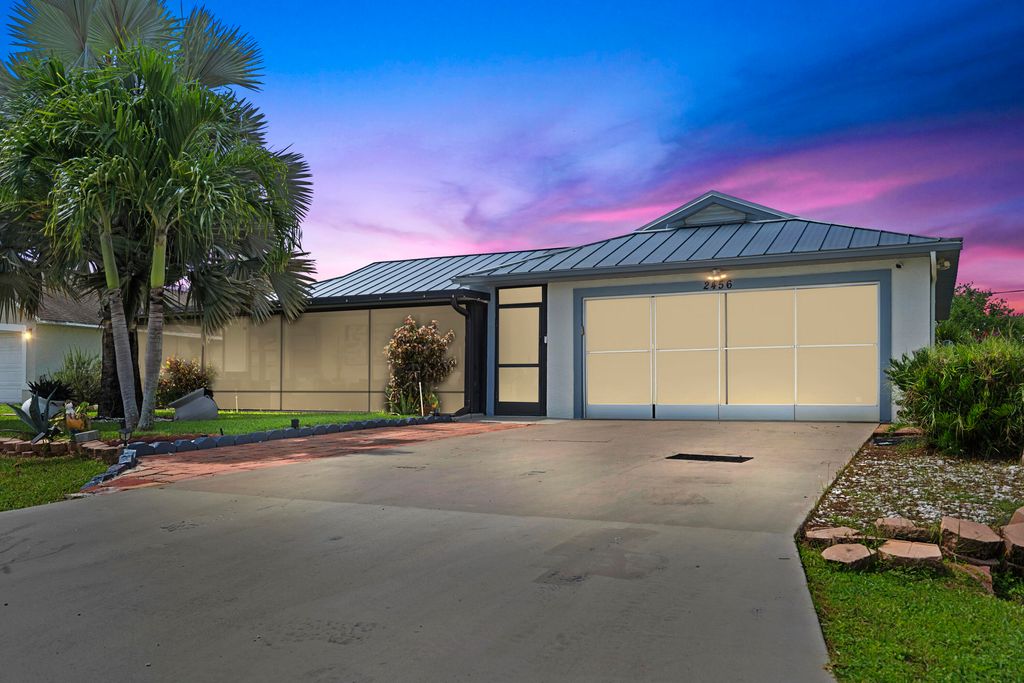 Photo of 2456 SE Blackhorse Street, Port Saint Lucie, FL 34984 (MLS # R11128337)