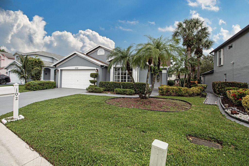 Photo of 102 Hammocks Court, Greenacres, FL 33413 (MLS # R11028650)