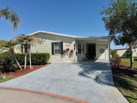 Photo of 8181 14TH HOLE Drive, Port Saint Lucie, FL 34952 (MLS # B26060066)