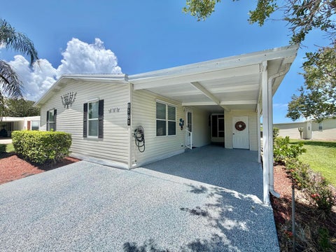 Photo of 8181 14TH HOLE Drive, Port Saint Lucie, FL 34952 (MLS # B26060066)
