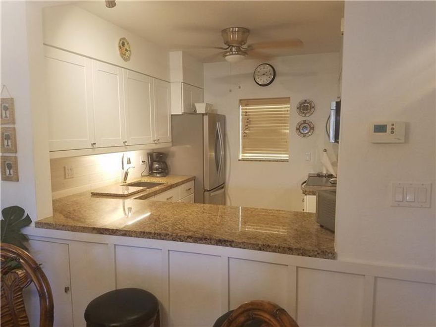 real florida WATERFRONT living in an updated, airy condo, dockage based upon availability. quaint, quiet complex, a great place to call home. convenient to shops, only 1 mile to deerfield beach!continuous hotwater provided by tankless water heater, hurricane shutters & impact windows, central a/c.  covered parking, plenty of guest spots! ss appliances, white cabinets. light diagonal tile and a GREAT, responsive LANDLORD.