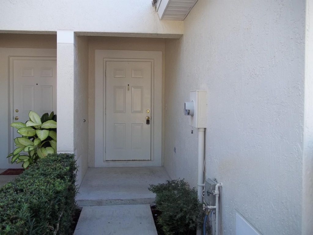 Photo of 9740 Lago Drive, Boynton Beach, FL 33472 (MLS # R10979249)