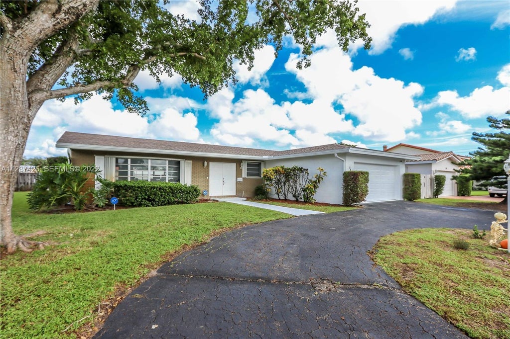 Photo of 5017 ROOSEVELT Street, Hollywood, FL 33021 (MLS # B26075016)