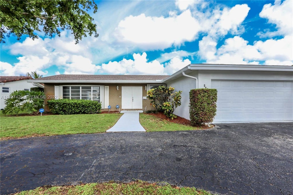 Photo of 5017 ROOSEVELT Street, Hollywood, FL 33021 (MLS # B26075016)