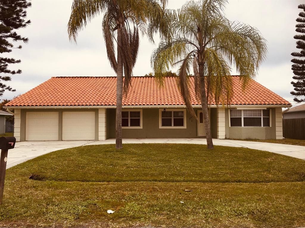 Photo of 2243 SE Trillo Street, Port Saint Lucie, FL 34952 (MLS # R10870180)
