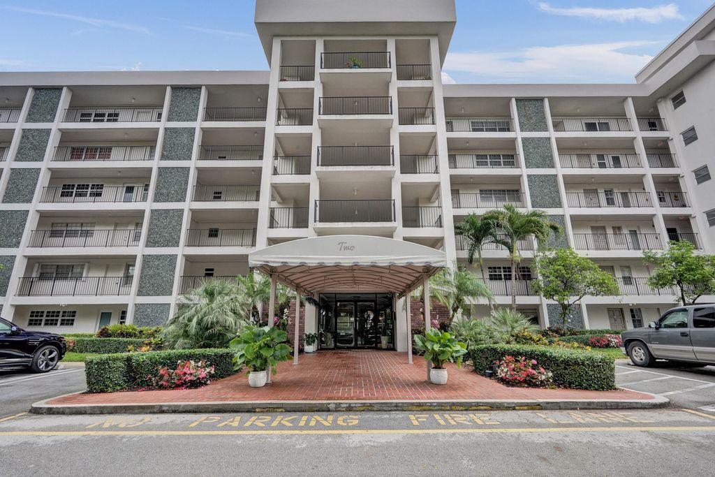 Photo of 2850 N Palm Aire Drive #401, Pompano Beach, FL 33069 (MLS # B26014053)