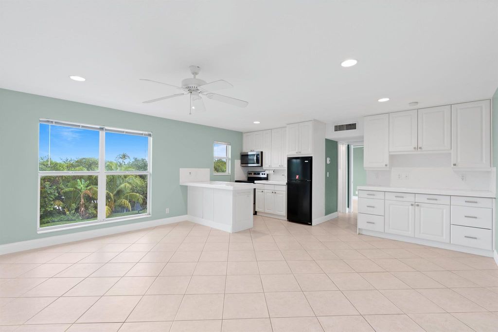Photo of 731 Hummingbird Way #9, North Palm Beach, FL 33408 (MLS # R11046356)