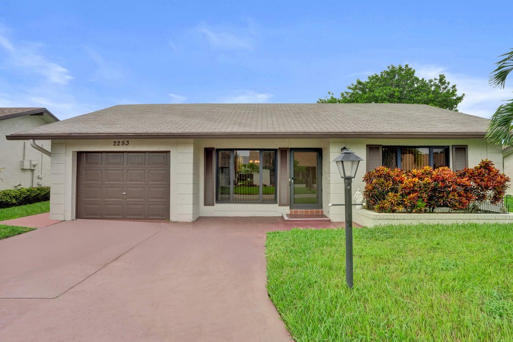 Photo of 2253 SW 17TH Drive, Deerfield Beach, FL 33442 (MLS # B26076439)
