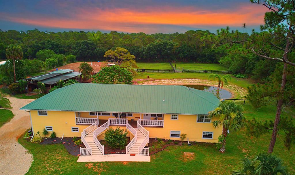 Photo of 7405 SW Citrus Boulevard, Palm City, FL 34990 (MLS # R10725242)