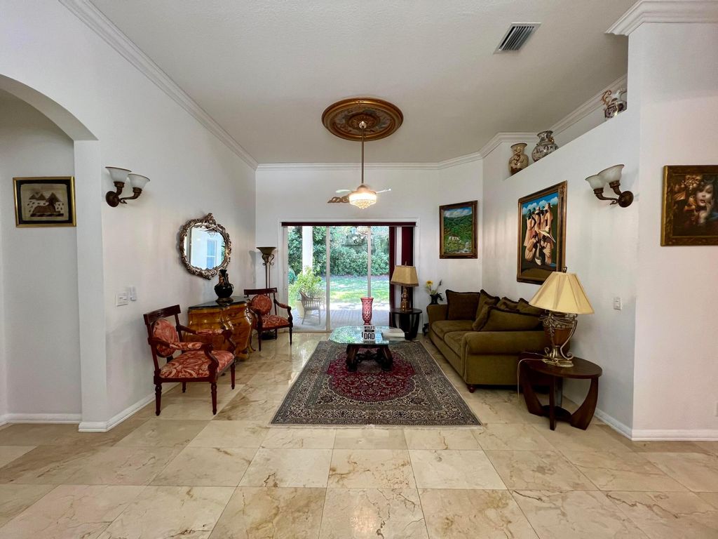 Photo of 11889 Osprey Point Circle, Wellington, FL 33449 (MLS # B26031719)