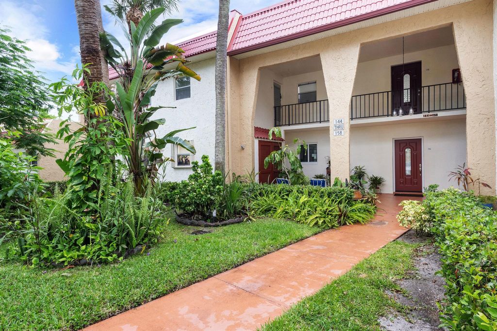 Photo of 146 Lake Evelyn Drive, West Palm Beach, FL 33411 (MLS # R11107547)