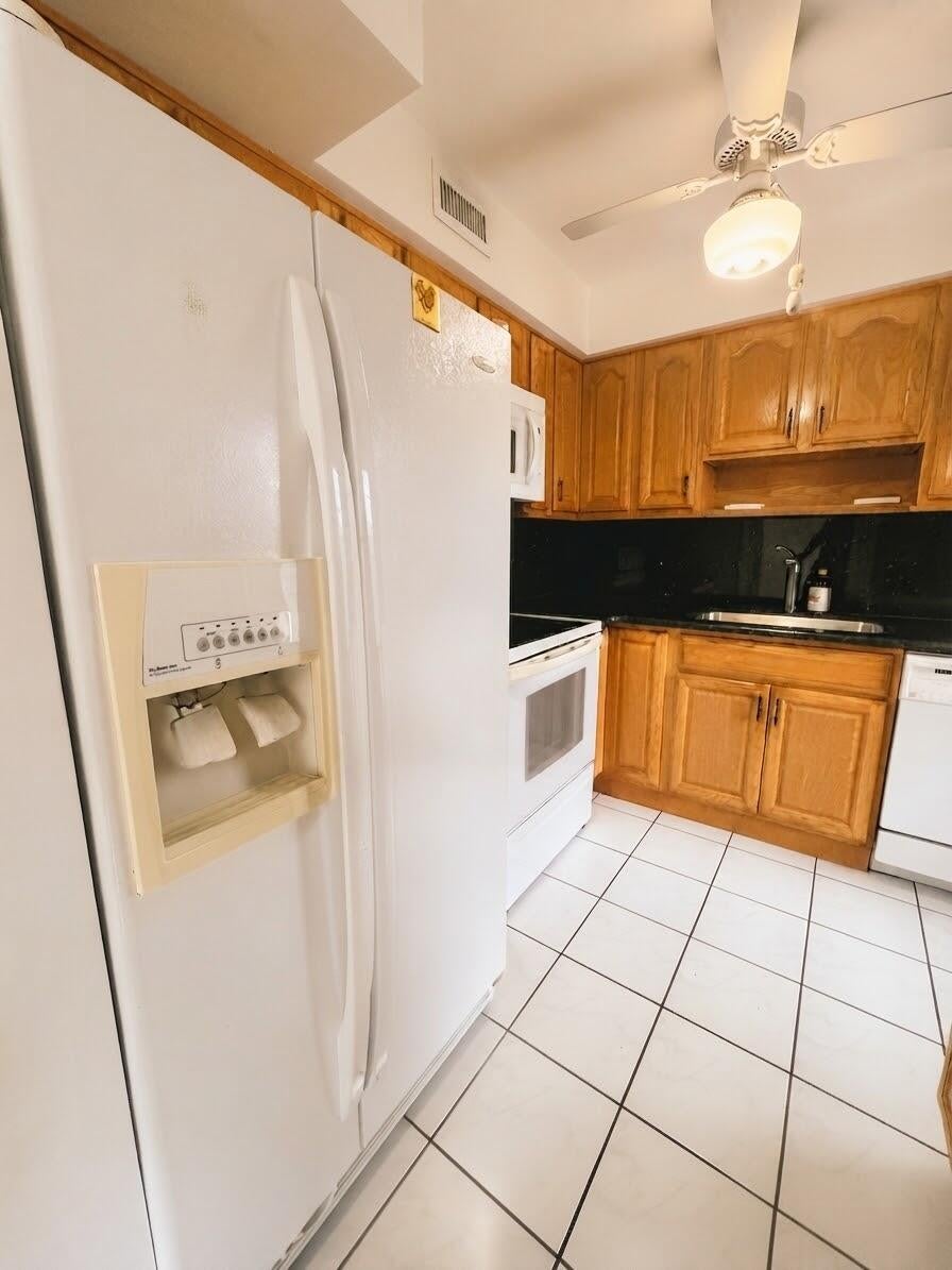 Photo of 777 SE 2ND Avenue #213, Deerfield Beach, FL 33441 (MLS # B26070623)