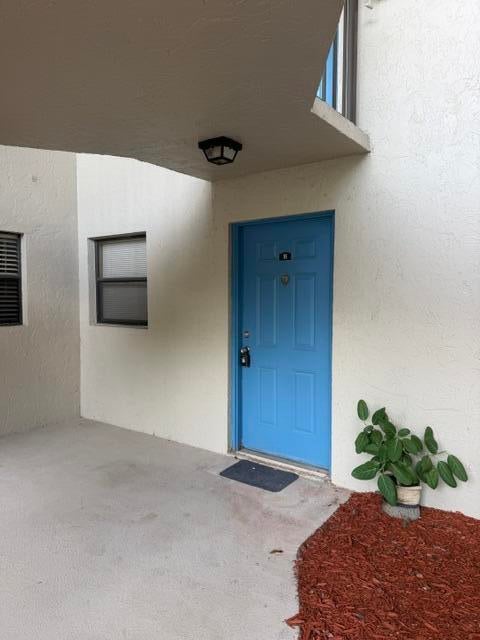 Photo of 1480 WINDORAH Way #B, West Palm Beach, FL 33411 (MLS # B26072170)