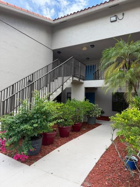 Photo of 1480 WINDORAH Way #B, West Palm Beach, FL 33411 (MLS # B26072170)