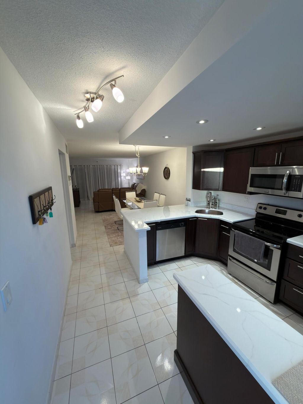 Photo of 450 Paradise Isle Boulevard #201, Hallandale Beach, FL 33009 (MLS # B26021090)