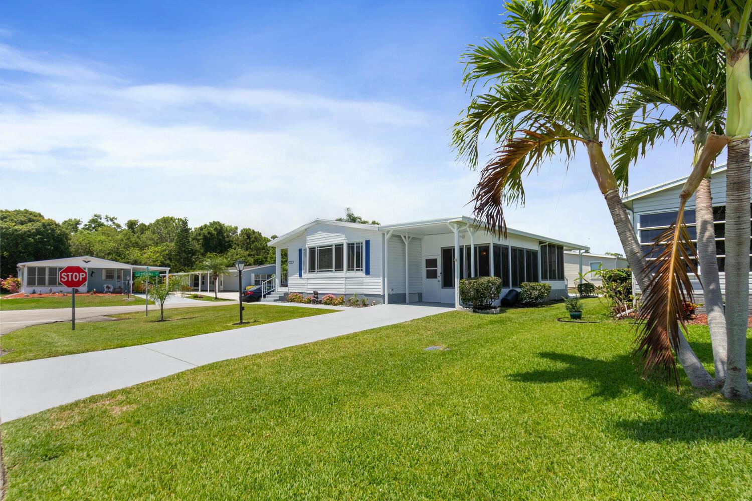 Welcome to 8529 Lidflower, a charming and well-maintained home located in the highly sought-after Savannah Club subdivision in Port St. Lucie where you own the land. This inviting residence offers a perfect blend of comfort and style, featuring spacious living areas and modern amenities.As you step inside, you'll be greeted by an open-concept layout that allows for seamless flow between the living room, dining area, and kitchen. This 2 bed, 2 bath home boasts 2 brand new roofs, a new ac unit, new hot water heater and upgraded electrical panel with surround sound speakers wired throughout. There is an enclosed patio perfect for entertaining which has new ac unit for this space as well. The master bedroom is a peaceful retreat, offering ample space and natural lighting.