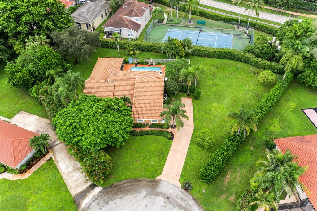 Photo of 7604 Lexington Ln, Parkland, FL 33067 (MLS # F10527579)