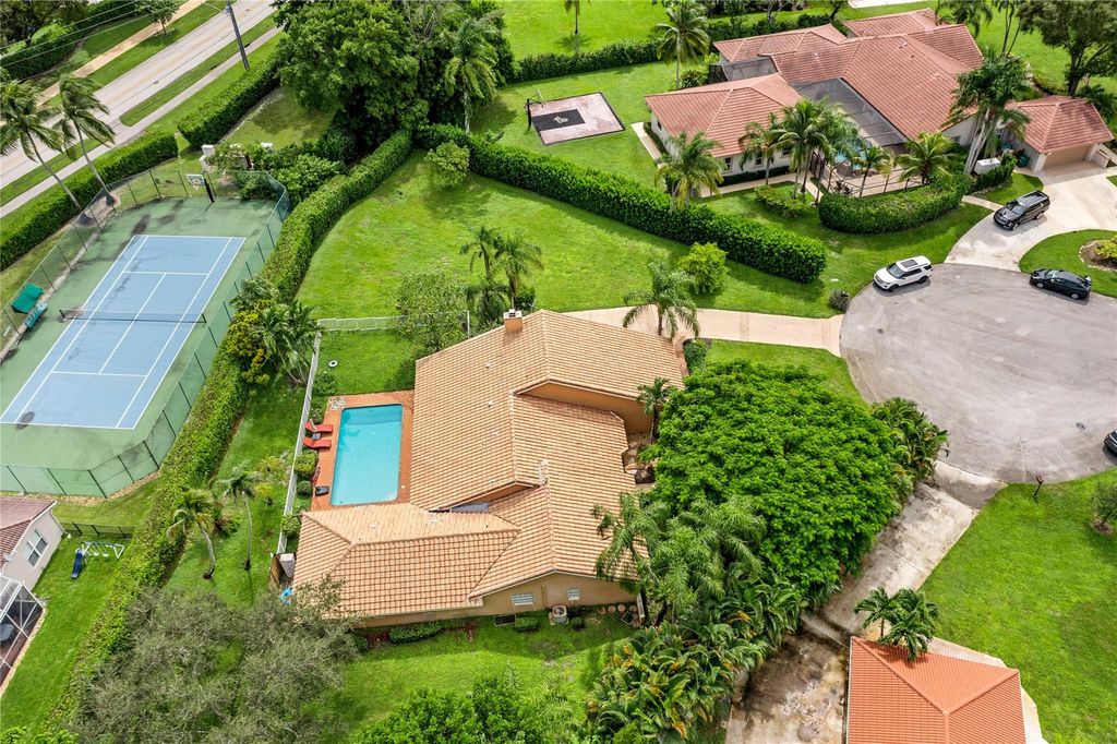 Photo of 7604 Lexington Ln, Parkland, FL 33067 (MLS # F10527579)