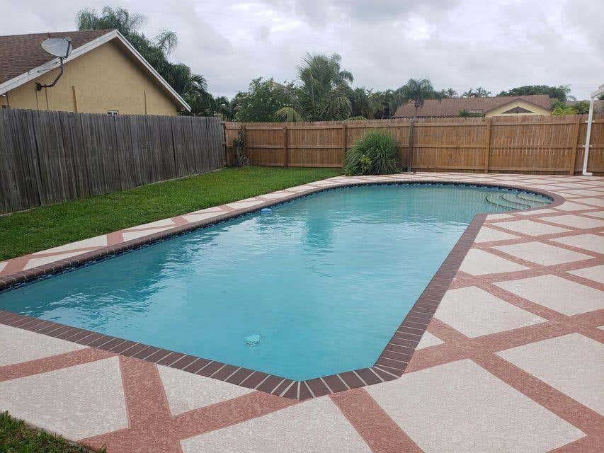 Photo of 9102 Bedford Drive, Boca Raton, FL 33434 (MLS # B26043339)