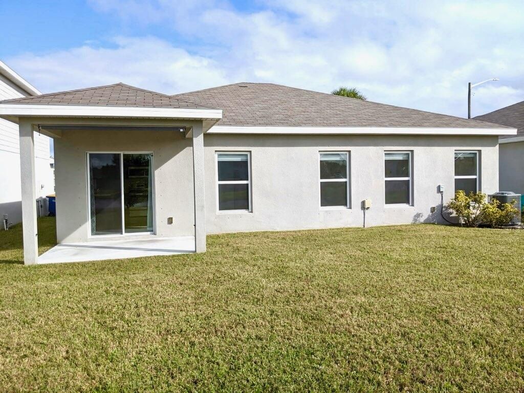 Photo of 604 Lychee Lane, Fort Pierce, FL 34981 (MLS # R11144683)