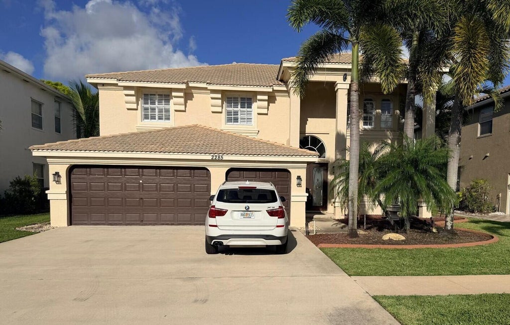 Photo of 2285 Ridgewood Circle, Royal Palm Beach, FL 33411 (MLS # B26036264)