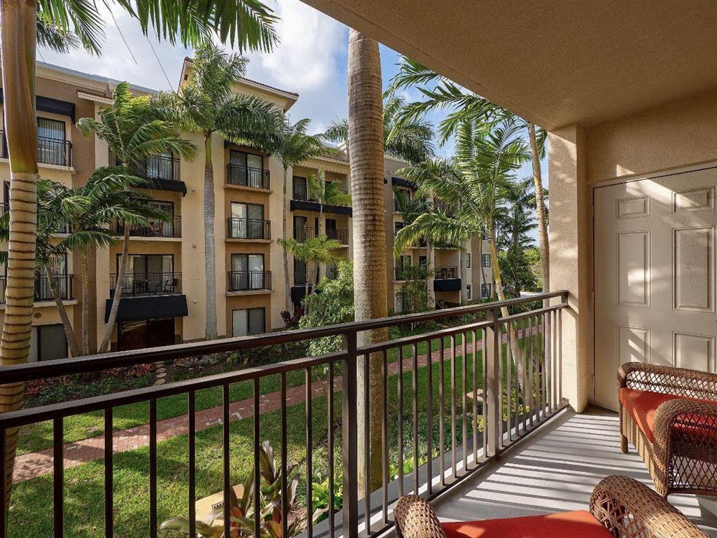 Check Out Video Tour! Best location In Midtown! Overlooking The Courtyard Section That Is Quiet & More Private. This Newer 3 bedroom 2 full bath condo is just steps to your car from your front door! Some features include split floor plan, light/bright throughout, crown molding, stainless steel appliances, black out shades, A rated schools, covered patio and large tub in master suite. Walk to restaurants, boutiques, salons, shopping and much more. Available with some furniture. This gated resort style community was built 2008 and offers fitness center, pool, hot tub, tennis, business center and lounge areas. Midtown is surrounded by ALL Palm Beach Gardens has to offer! Close to I-95, Florida's turnpike , Gardens Hospital and The Gardens Mall.