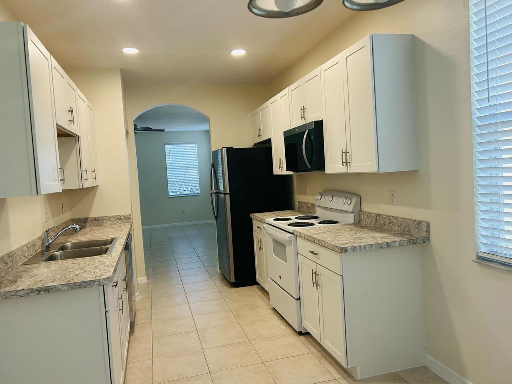 Photo of 2124 SE Eatonville Drive, Port Saint Lucie, FL 34952 (MLS # B26020307)