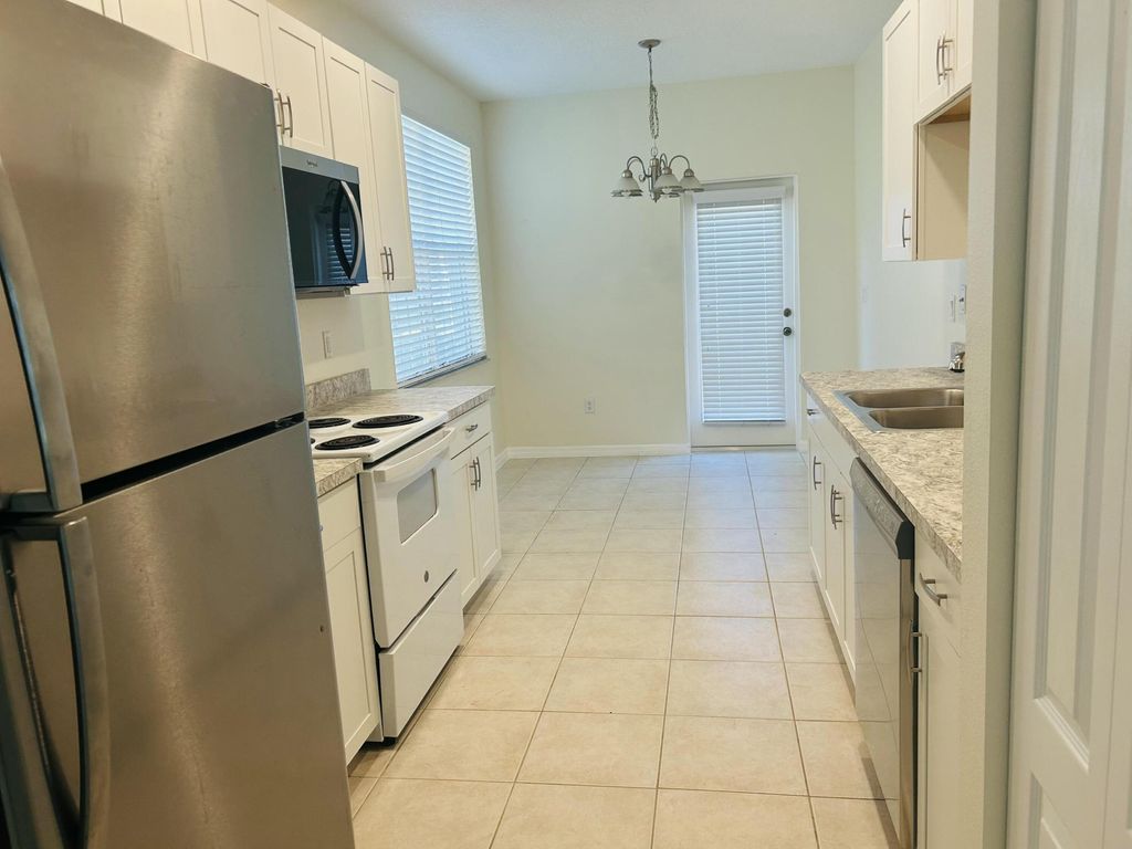Photo of 2124 SE Eatonville Drive, Port Saint Lucie, FL 34952 (MLS # B26020307)