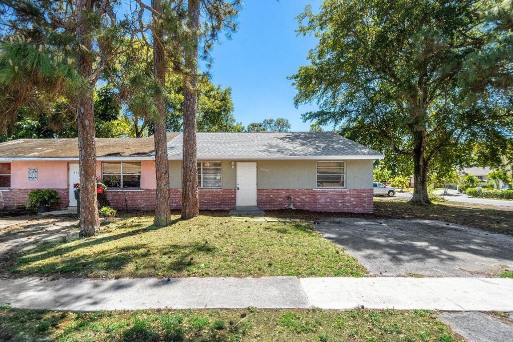 Photo of 4778 Gladiator Circle, Greenacres, FL 33463 (MLS # R11075508)