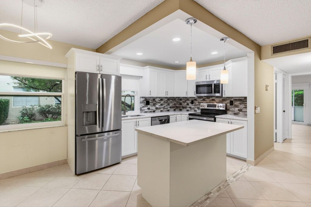 Photo of 293 Normandy G, Delray Beach, FL 33484 (MLS # R11162463)
